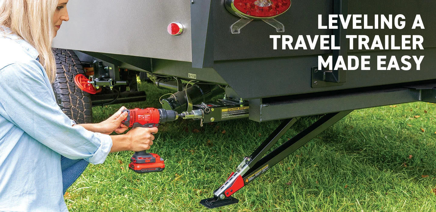 RVer leveling a travel trailer