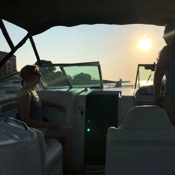 Boat Cockpit with Two Boaters