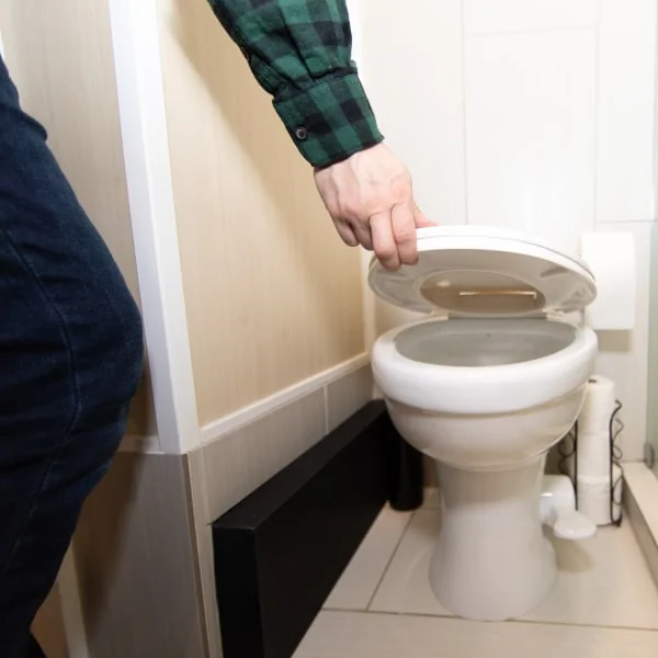 RV toilet opened lid and seat
