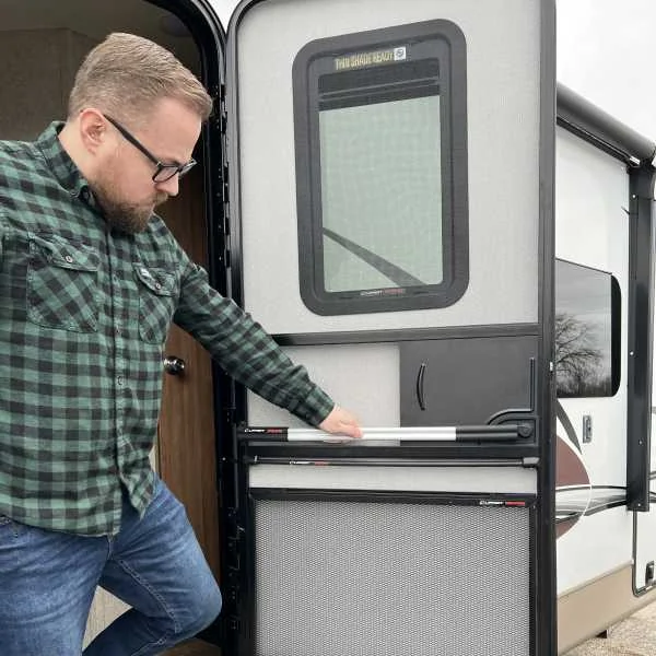 RV screen door latches and locks installed on a camper