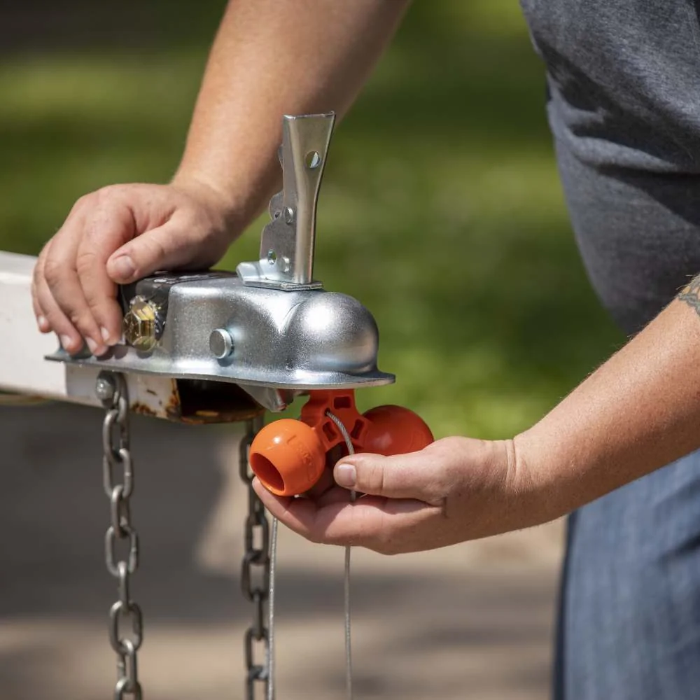 Straight-tongue trailer coupler with tongue lock