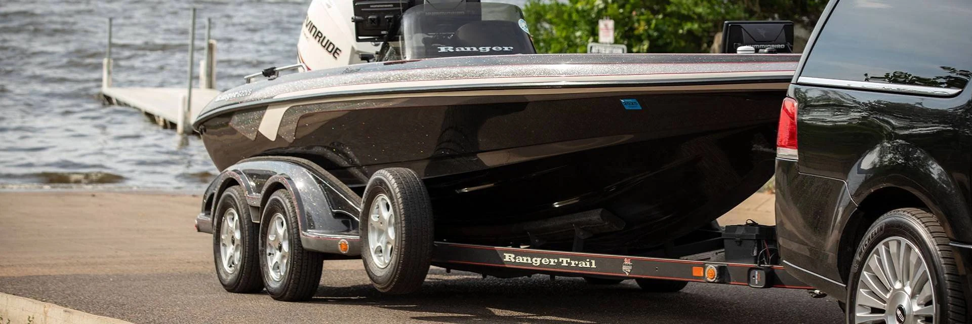 SUV Pulling a Boat Trailer with Boat