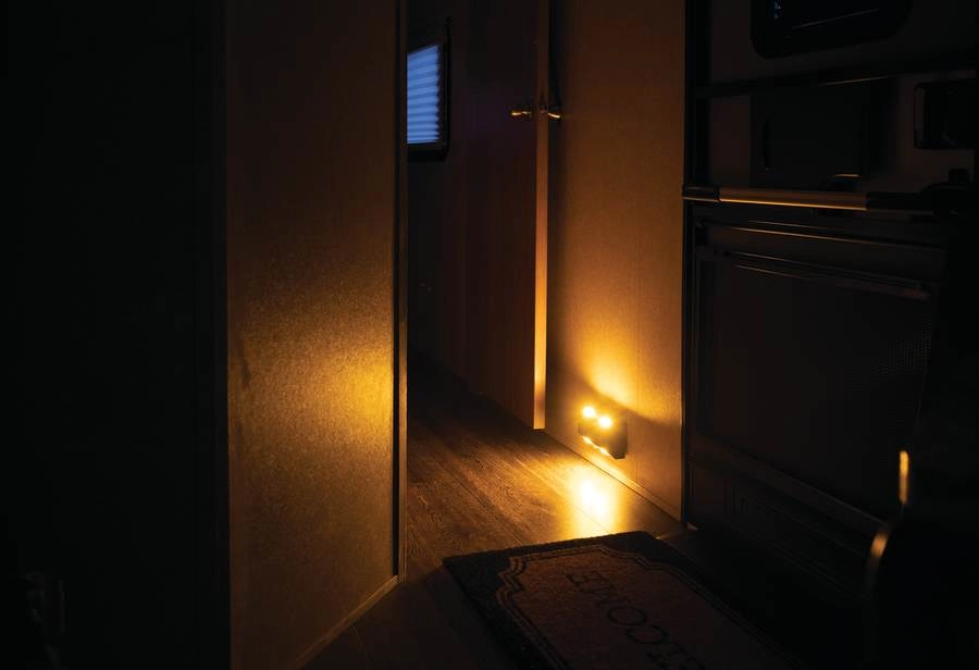 Lippert Motion-Activated RV Step Light being used in an RV hallway