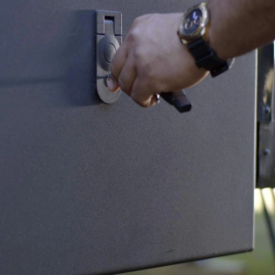 Person locking the Solid Step storage box