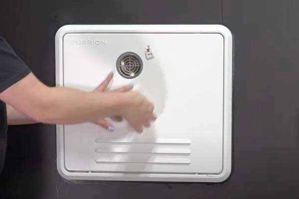 Secure water heater door with latch