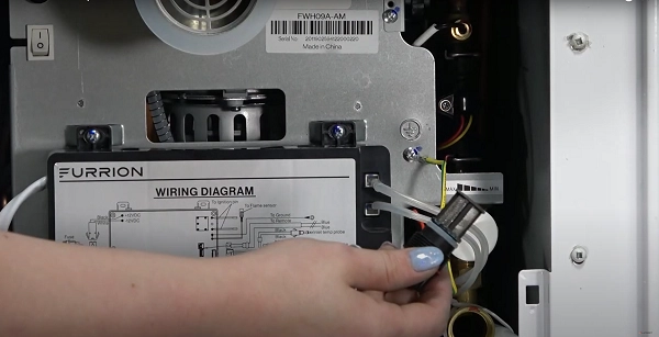 RV water heater filter replacement check