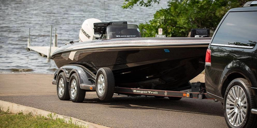 SUV Pulling a Boat Trailer with Boat SUV Pulling a Boat Trailer with Boat